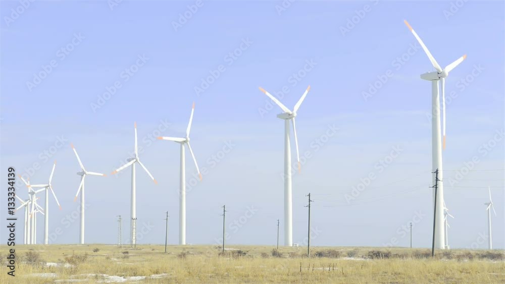 Wind Turbines generating electricity on blue sky Wind Turbines generating electricity on blue sky