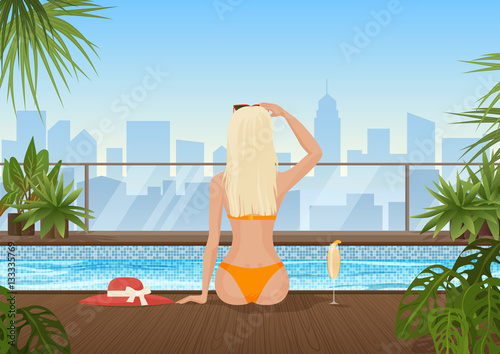 Pretty young woman in the swimming pool with beautiful palm park city view. Beautiful girl enjoying in the pool.