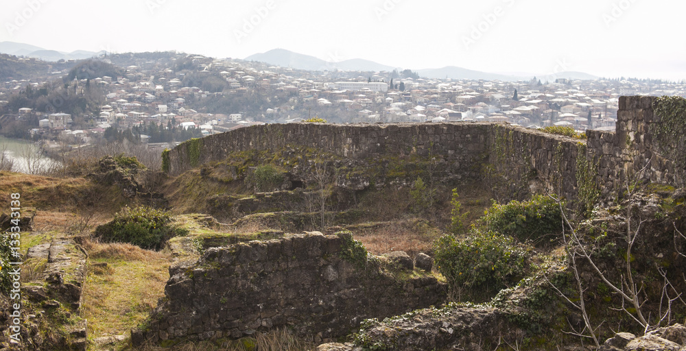 the ruins of an ancient fortress on a background of Kutaisi, Georgia
