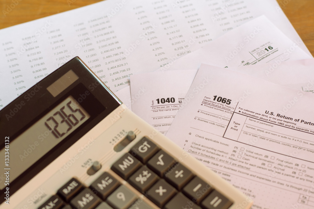 US tax form with pen taxation concept US tax form with pen taxation concept