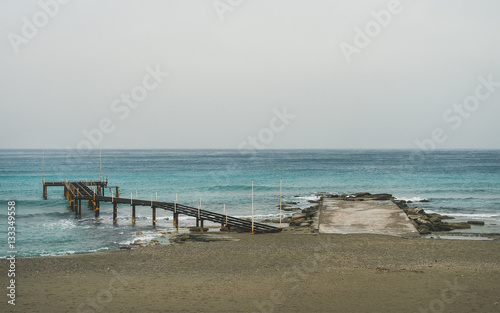 Empty sandy coast at Mediterranean sea in winter after storm in Alanya  Turkey