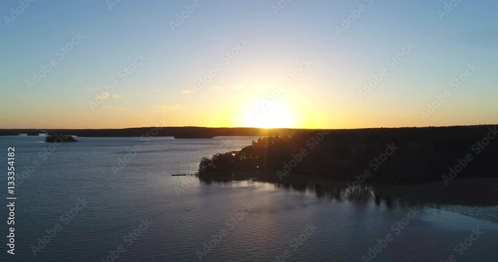 Cinema 4k aerial flight above koivuniemi or björkudden, , at a sunset in the finnish archipelago of Inkoo, in Finland Cinema 4k aerial flight above koivuniemi or björkudden, , at a sunset in the finnish archipelago of Inkoo, in Finland