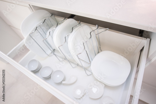 Plates in a kitchen drawer