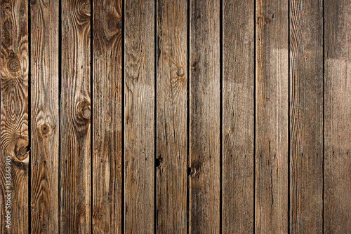Old weathered wooden fence or wall cladding