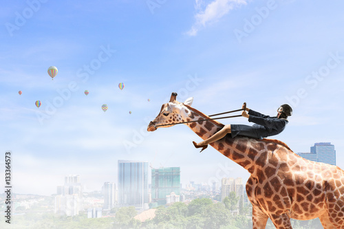 Woman ride giraffe . Mixed media