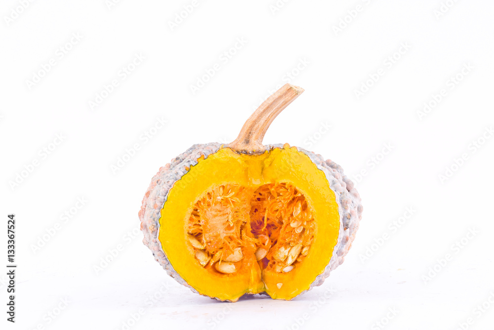 golden pumpkin squash and pumpkin slices on white background healthy  kabocha Vegetable food isolated
