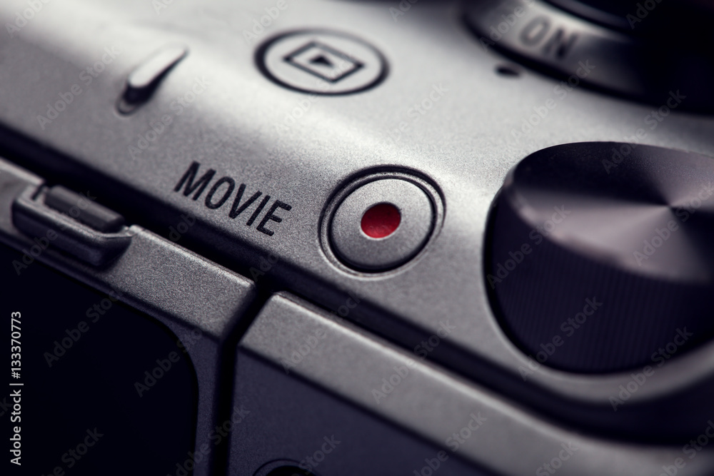 movie play button on the body of modern audio-video devices