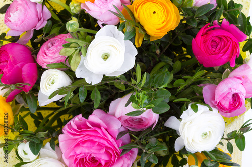 Bright buketny composition from fresh flowers  the white isolated background