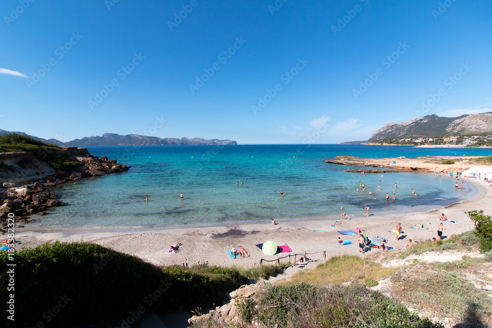 Mallorca beach with turquoise water and bright blue sky