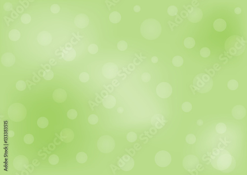 Green horizontal background with light spots.