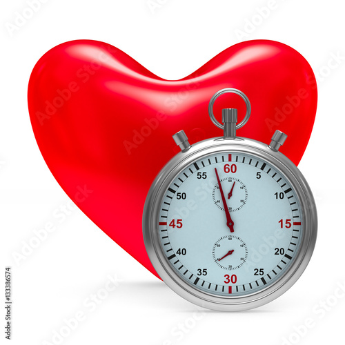 heart and stop watch on whi...