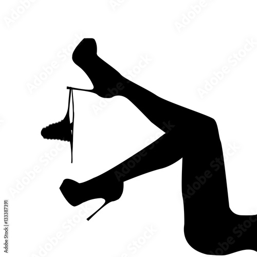 Women's leg with panties hanging on it