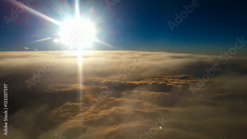 The sunrise from the window of the airplane