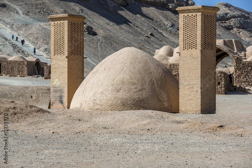 old water reservoir next to Zoroastrian Towers of Silence in Yazd city, Iran photo