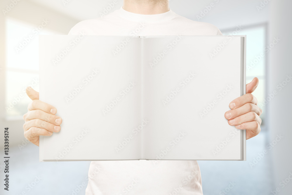 Man holding empty book