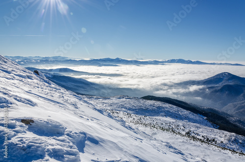 Snow lanscape at the top of a mountain © kialu