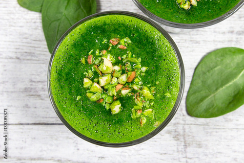 Slimming cocktail with spinach. Glasses of spinach juice.