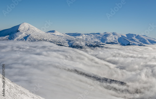 Snow lanscape at the top of a mountain © kialu