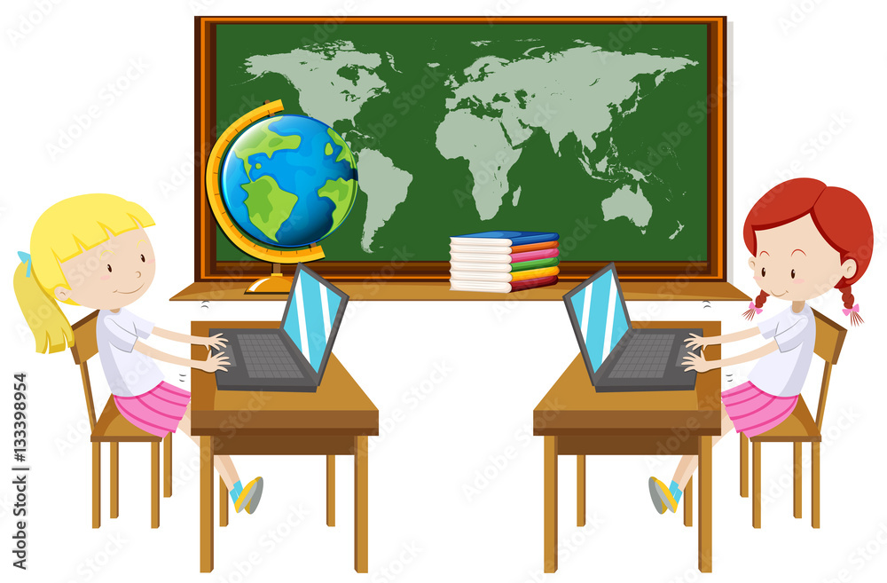 Two girl working on computer in classroom