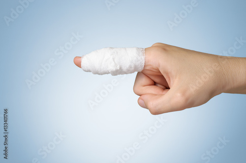 Canvas Print Injured finger with bandage