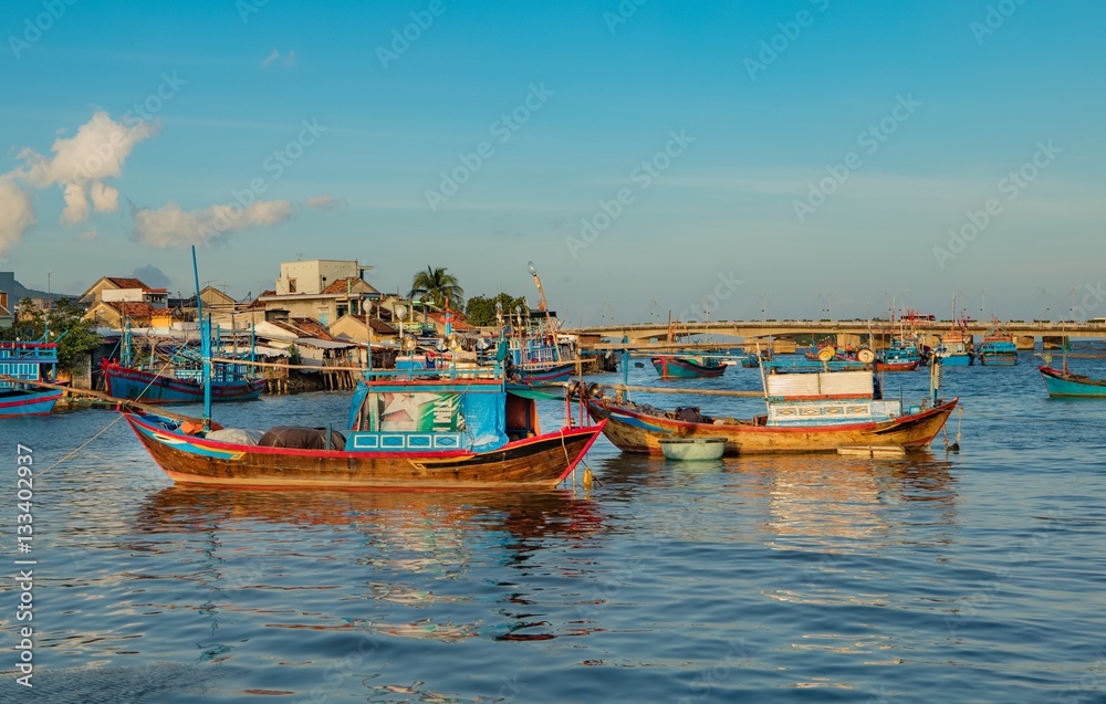 A selection of Vietnamese fishing boat's on the cai river natural harbour in Nha Trang Vietnam.