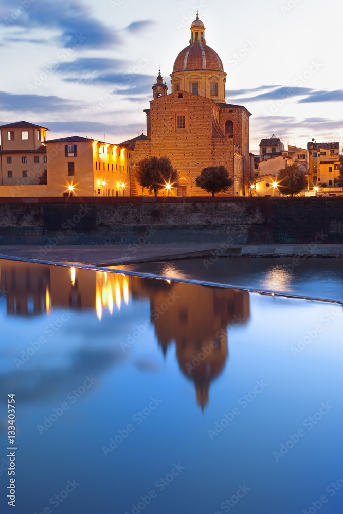 By night beautiful view of Arno river with Archdiocesan Seminary bell tower, Firenze, Tuscany, Italy