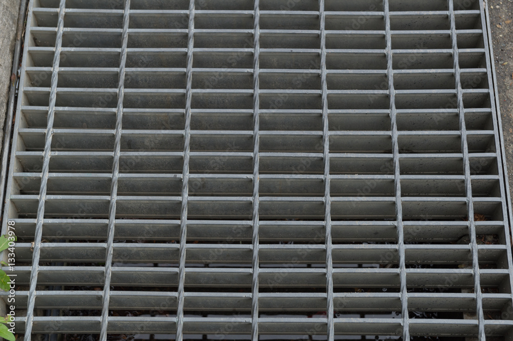 Metal grate detail. Black and white image. Metal grate detail. Black and white image.
