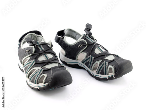 extreme sport sandals, pair of trekking or climbing shoes isolated on white