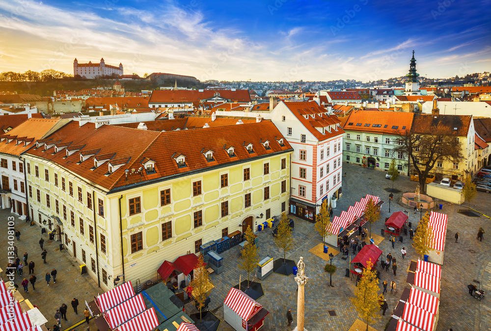View on the square in old town of Bratislava with Bratislava castle in the backround,Slovakia