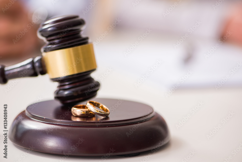 Judge gavel deciding on marriage divorce Judge gavel deciding on marriage divorce