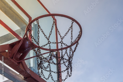 Photo of glass basketball hoop and blue sky background,basketbal