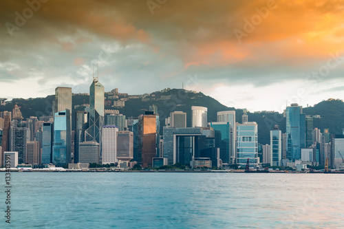 Hong Kong central business downtown sea front with sunrise sky background
