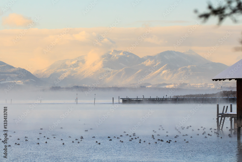  Smoke on Lake Chiemsee at sunrise with Alps in the Background