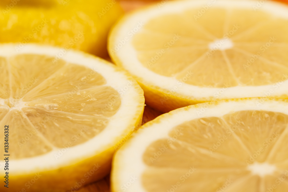 Closeup of lemon slices, low focus, blurry Closeup of lemon slices, low focus, blurry