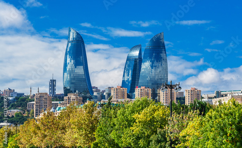 Flame towers in Baku cityscape. photo