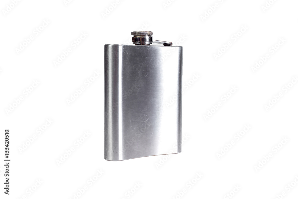 Stainless hip flask isolated on a white background. Alcohol addiction. Stainless hip flask isolated on a white background. Alcohol addiction.