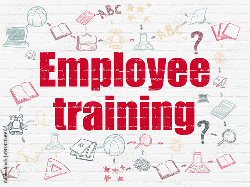 Education concept: Employee Training on wall background