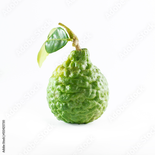 Green rough peel bergamot fruit or kaffir lime isolated on white