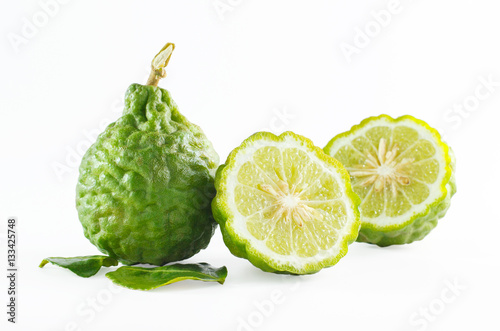 Green rough peel bergamot fruit or kaffir lime isolated on white