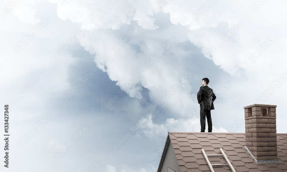 Mister boss on brick roof with arms akimbo. Mixed media