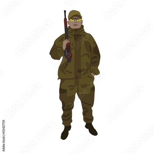 Hunter with a gun on an isolated background