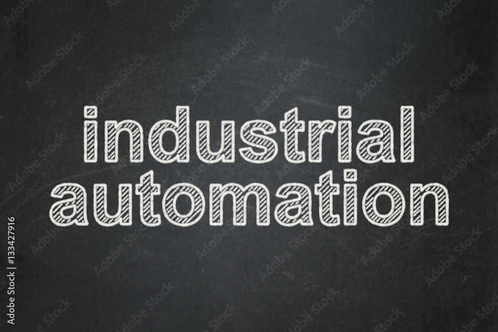 Fototapeta premium Manufacuring concept: Industrial Automation on chalkboard background
