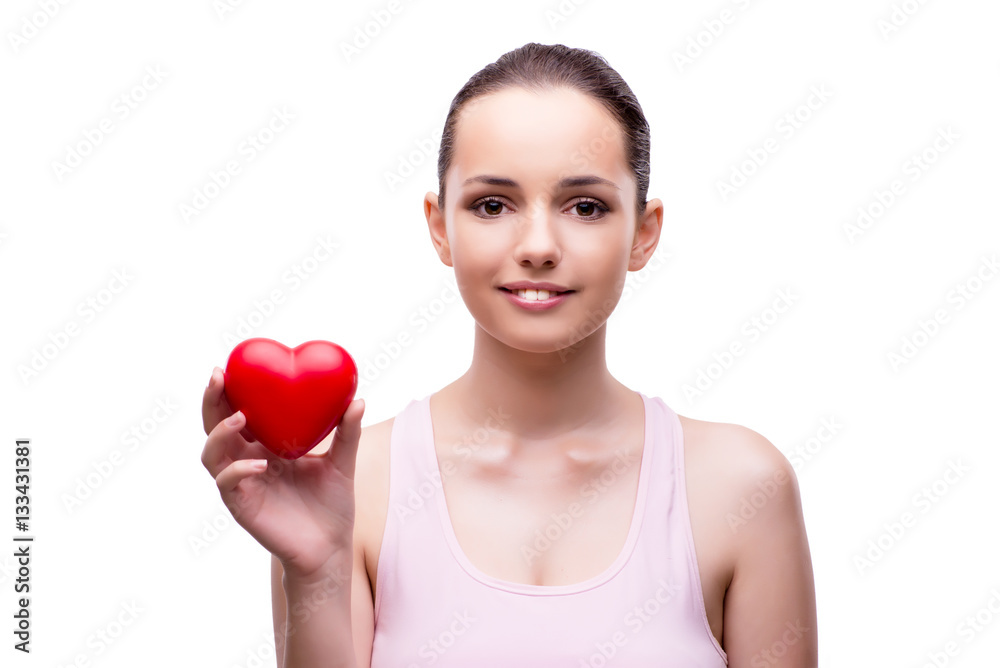 Young woman with red heart isolated on white Young woman with red heart isolated on white