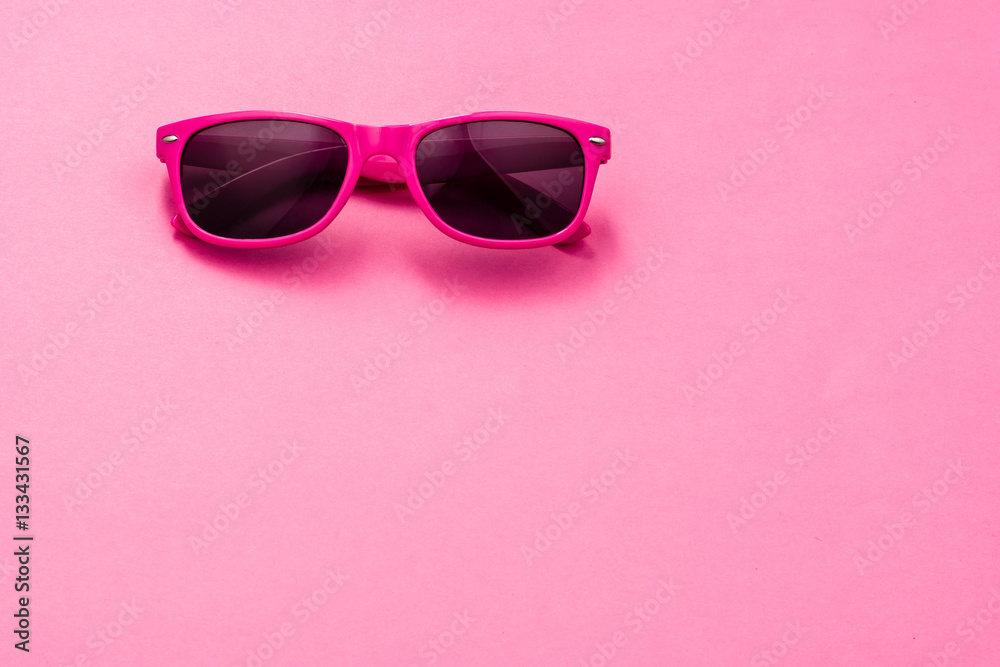 Modern sunglasses on colorful background with copy space. Product photograph with room for text.
