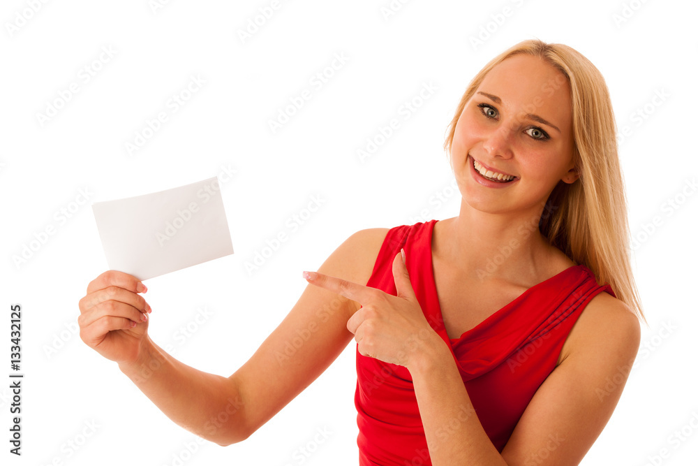 Cute blond woman with blank white banner in her hands smiling is Cute blond woman with blank white banner in her hands smiling is