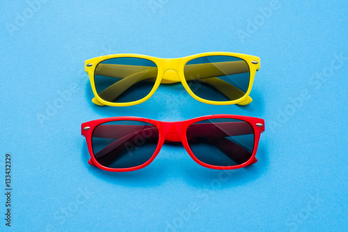 Modern sunglasses on colorful background with copy space. Product photograph with room for text.