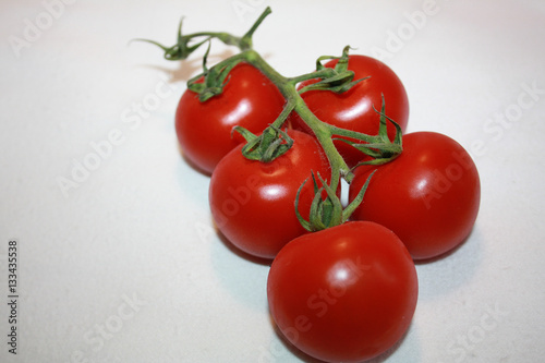 Tomatos on white