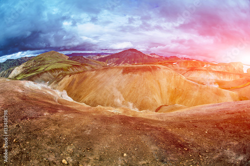 Valley National Park Landmannalaugar. On the gentle slopes of the mountains are snow fields and glaciers. Magnificent Iceland in the August