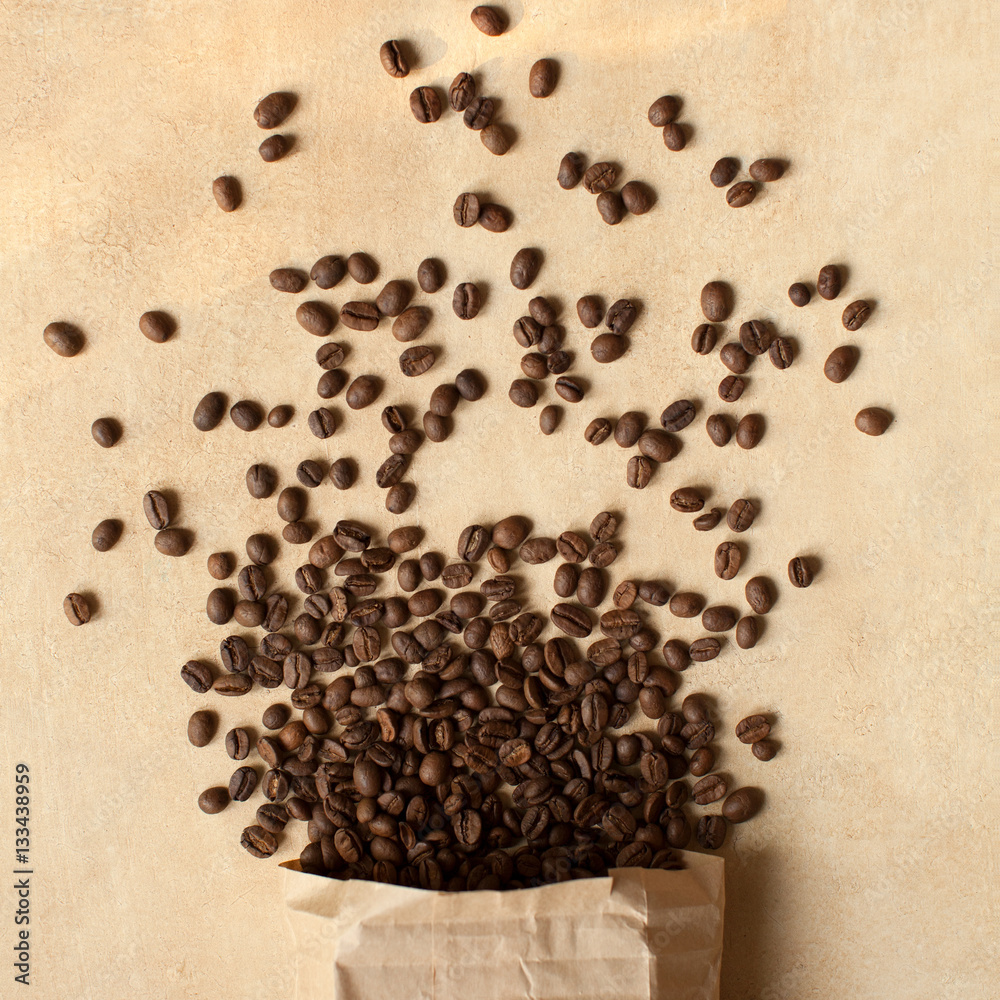Scattered coffee beans background Scattered coffee beans background
