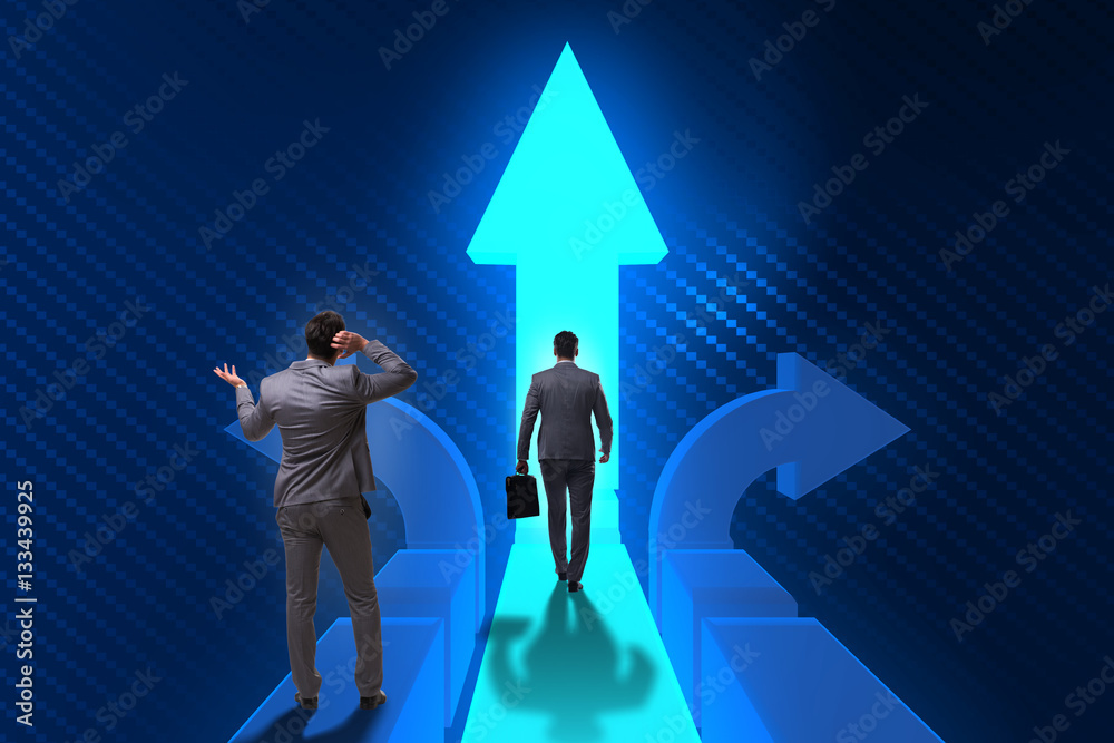 Fototapeta premium Businessman in difficult choice concept